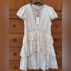 LoveShackFancy
Binselle Flutter Sleeve Mini Dress